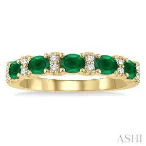 1/6 Ctw Oval Shape 4x3MM Emerald and Round Cut Diamond Precious Band in 14K Yellow Gold