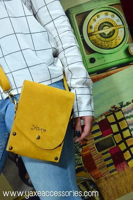 Yellow belt bag from leather and wood