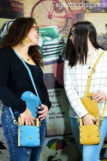 Yellow belt bag from leather and wood